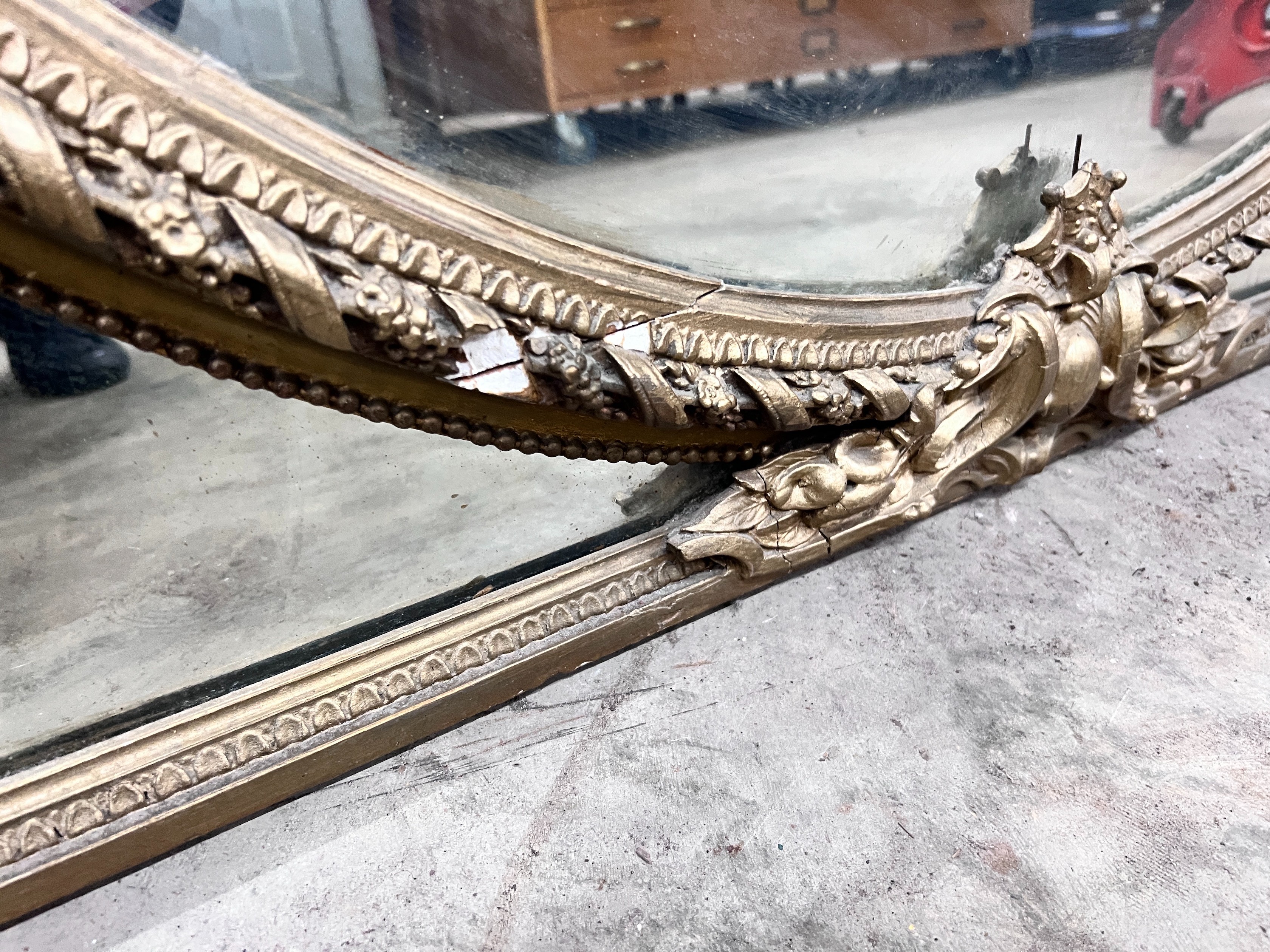 A late Victorian gilt gesso overmantel mirror, width 144cm, height 150cm *Please note the sale commences at 9am.
